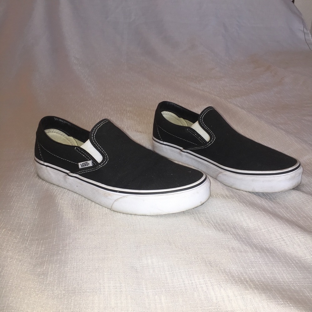 Black vans slip on